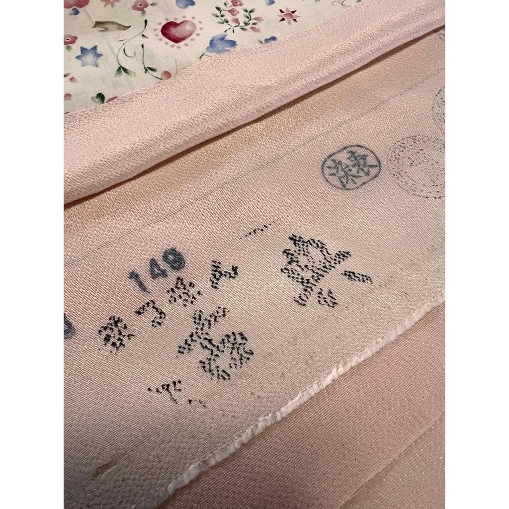 Used Bargain item Coral pink chrysanthemum lining with remaining cloth attached