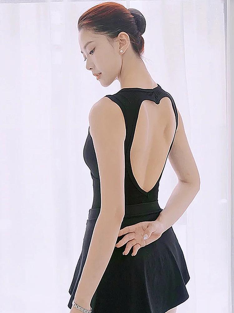 Women's Ballet-Style Yoga Jumpsuit: Open Back, Body Shaping Design for Adult Practice and Art Exams.