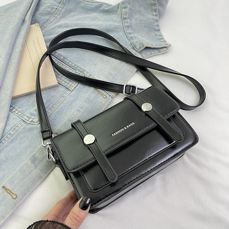 

New niche design popular mother and child mail carrier bag versatile single shoulder messenger women s bag чёрный