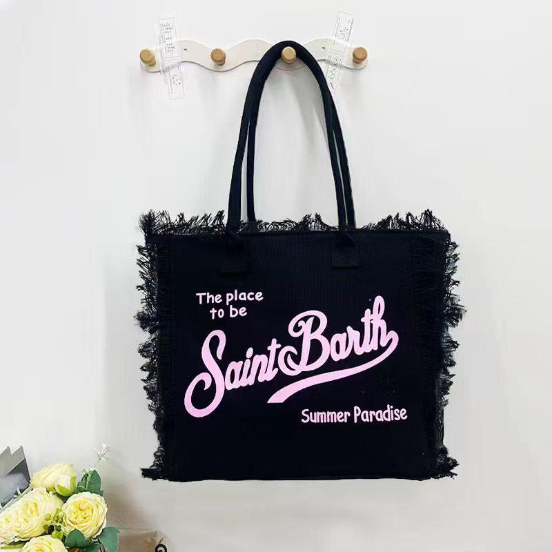 Large Capacity Canvas Tote Bag with Denim Fabric and Tassel Design for Commuting
