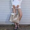 Internet Celebrity Explosion Star Woven Bag Champagne Tote Bag Large Capacity Gun Same Hand Shoulder Bucket Bag
