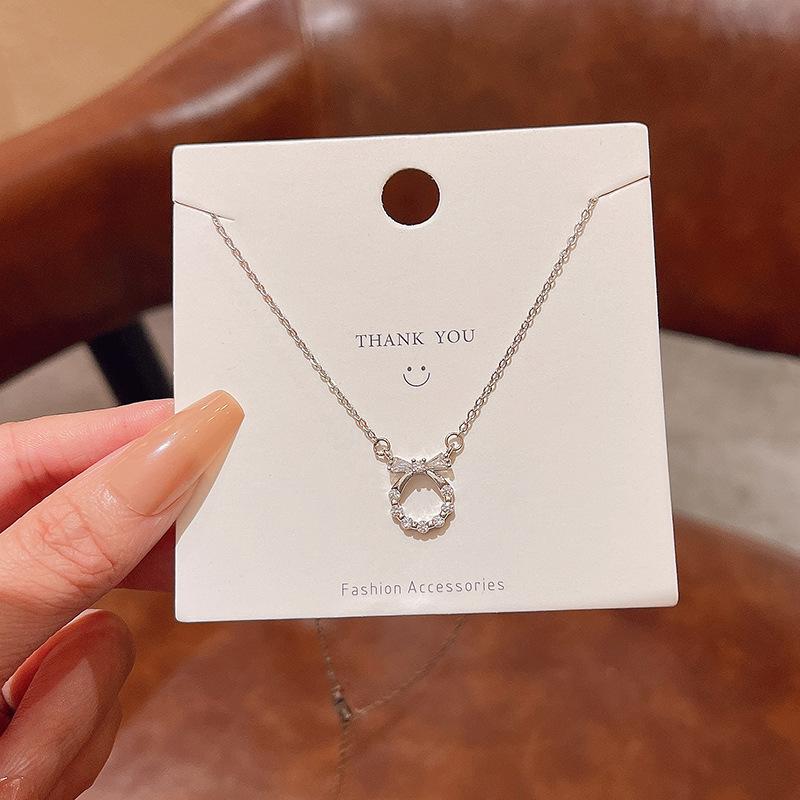 Light Luxury Niche Titanium Steel Necklace Women's Senior Design Sense Zircon Bow Clavicle Chain Neck Chain