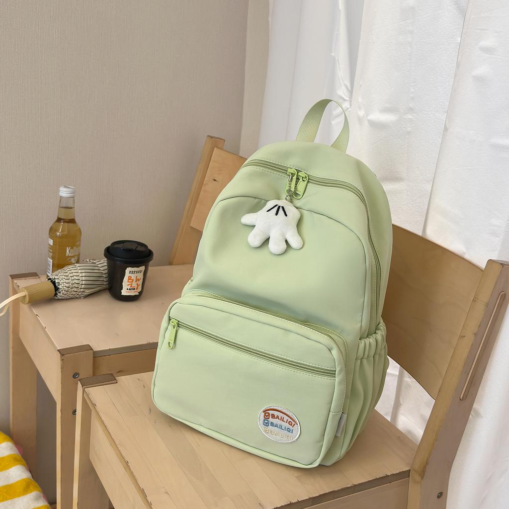 Schoolbag new Japanese simple solid color lightweight casual backpack high value junior high school students large capacity travel backpack