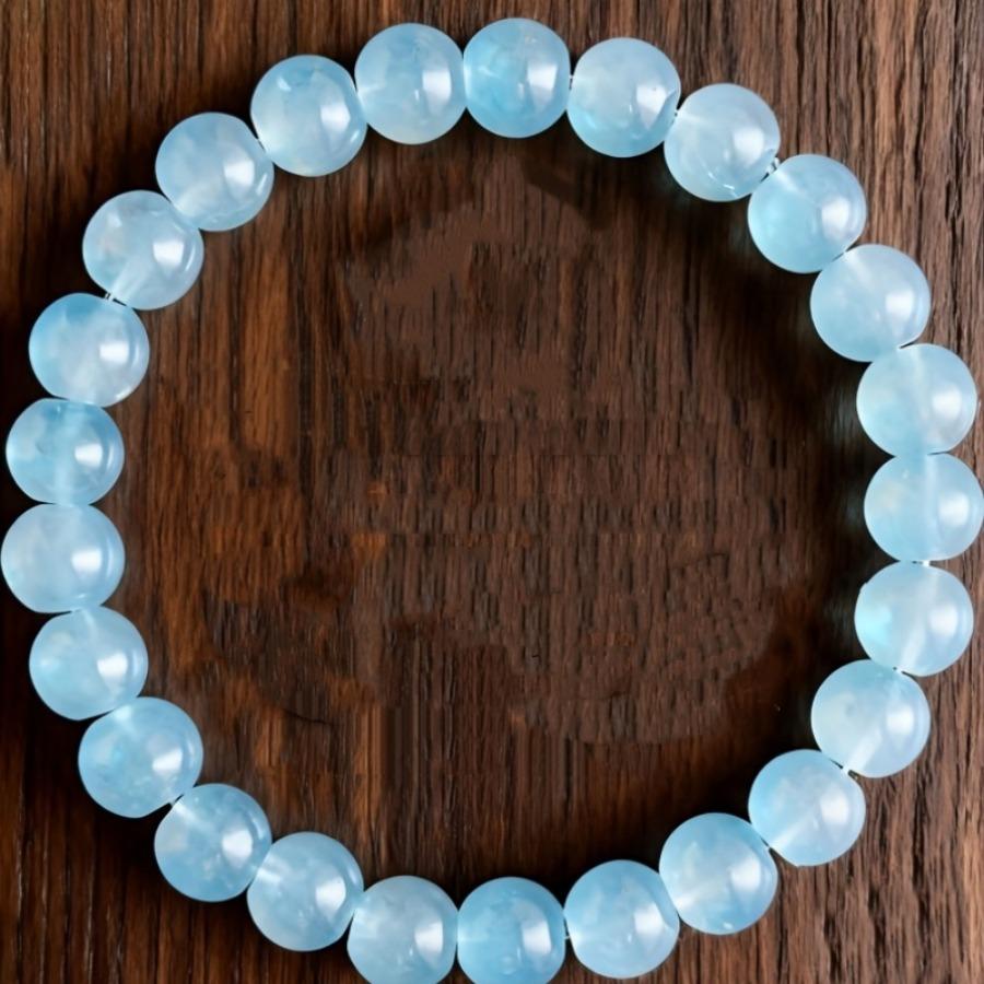 An 8Mm Natural Deep Sea Ice Stone Bracelet Featuring Bohemian Style Stone Jewelry, Serving As a Talisman for Spirit And Luck, Perfect for Casual Wear