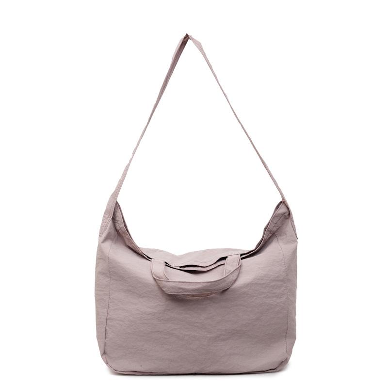

Casual large-capacity handbag women s 2025 summer new simple tote bag solid color trendy fashion shoulder messenger bag