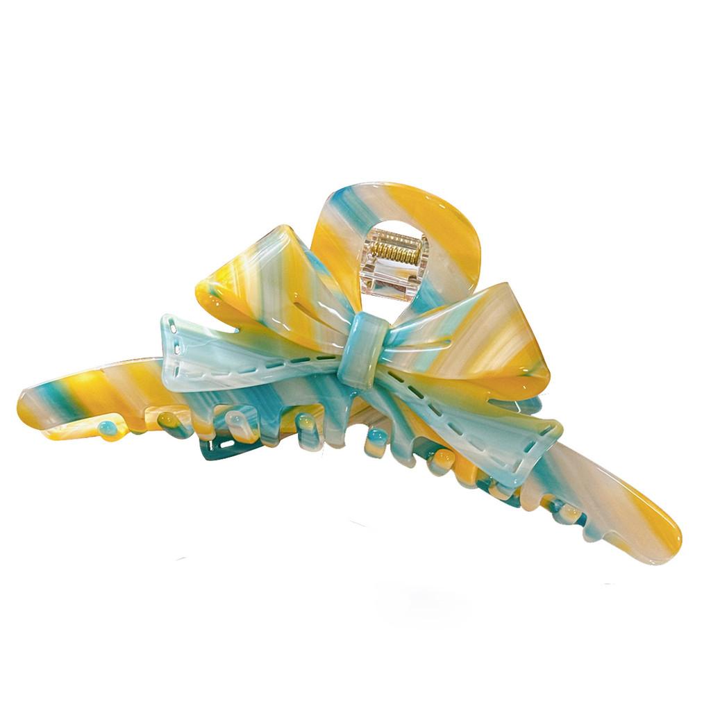 Fashionable Womens Hair Claw Clip In Sophisticated Acetate With Charming Bow Detail