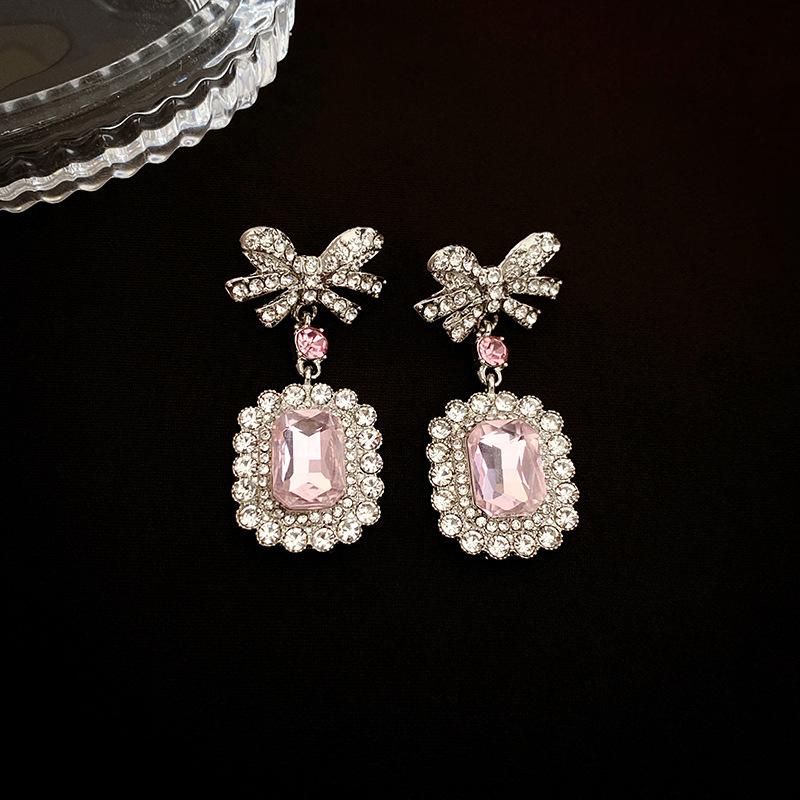 Diamond-encrusted zircon crystal bow square silver needle earrings niche style earrings.