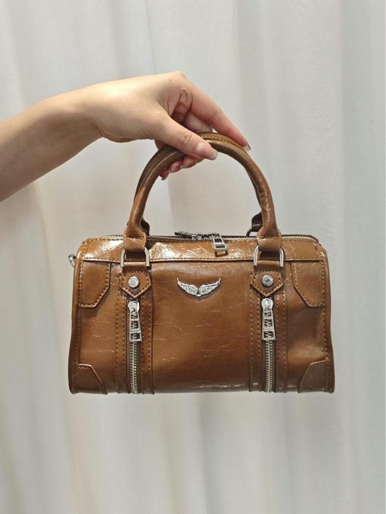 Ekskluzywna torebka na ramię ze skóry lakierowanej z graffiti 2025 z klasycznym wzorem skrzydeł