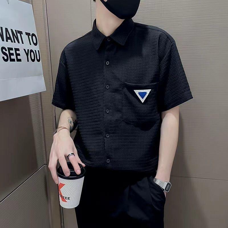 

Мужская одежда Однотонные рубашки Стильные текстурированные вафельные Летние повседневные Карманы Вставки Универсальные Отложной воротник Однобортные рубашки XXXL чёрный