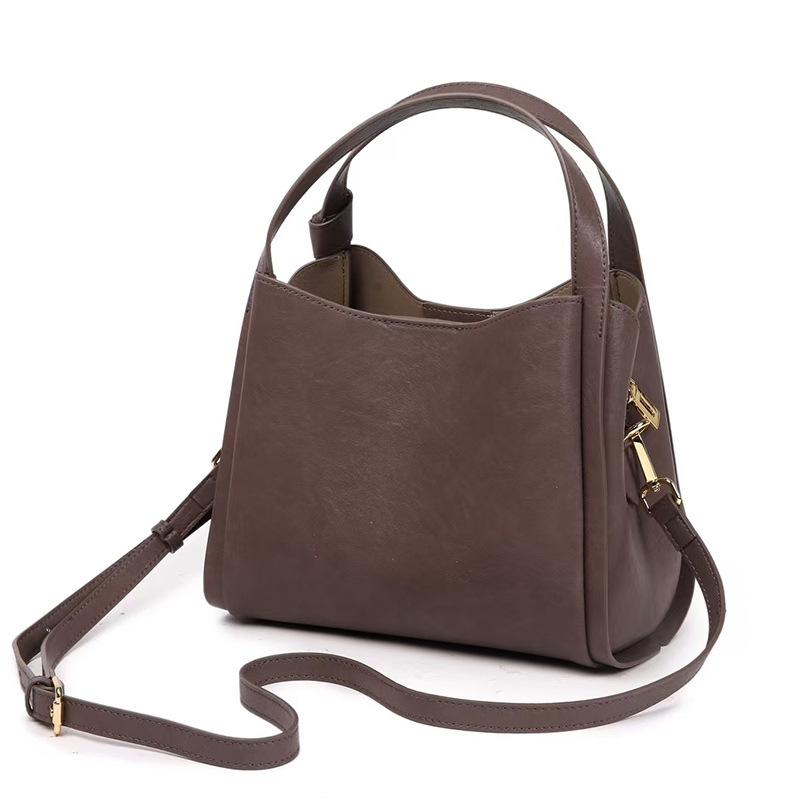 

2025 Осень Зима Новая Сумка-корзина из коровьей кожи, Сумка на одно плечо, Сумка через плечо для通勤 23*20*14 фиолетовый