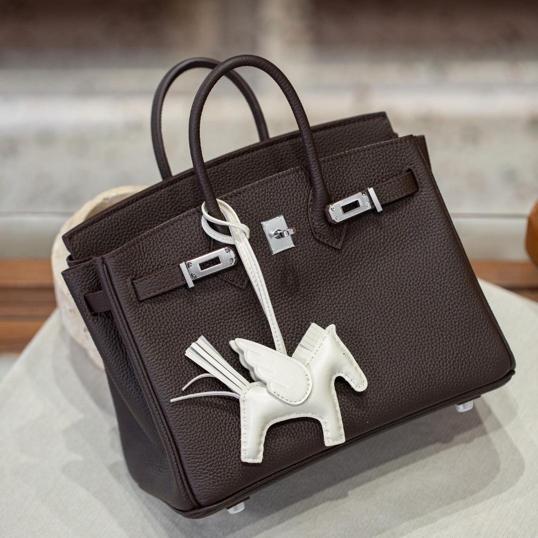 

Сумка-трансформер из коровьей кожи Togo с внутренним швом Safi Thread Platinum с высокой вместимостью 25/30 через плечо 25x14x19cm серебряный/эбеновый