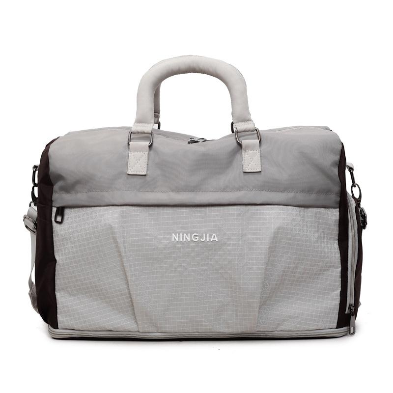 

Travel bag Women s large-capacity short-distance luggage bag New sports fitness bag Swimming out travel boarding bag сірий колір