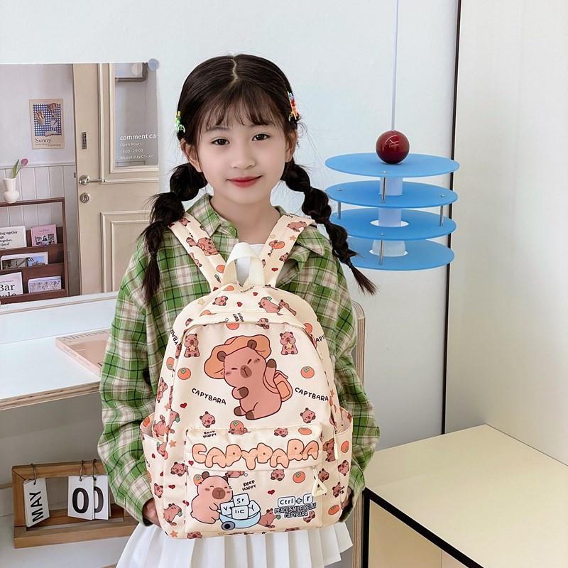 Cute Girl Backpack Featuring Cartoon Capybara Pattern And Ergonomic Shoulder Straps For Elementary Students