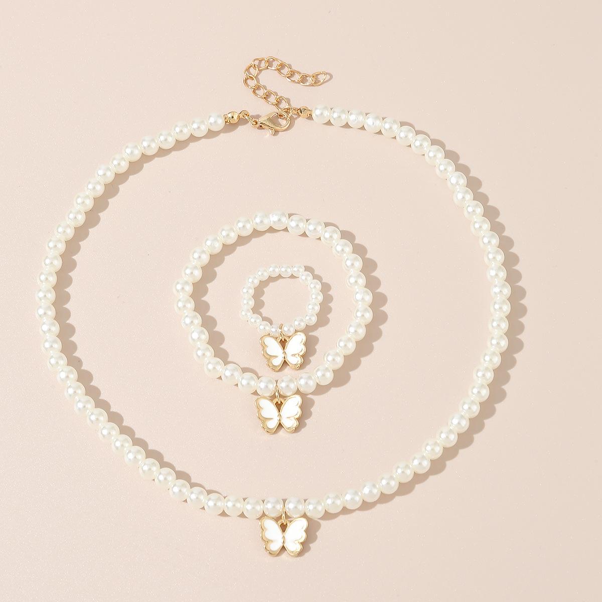 

Fashion simple temperament accessories Zircon children butterfly Zircon necklace bracelet ring 3 pieces suit білий