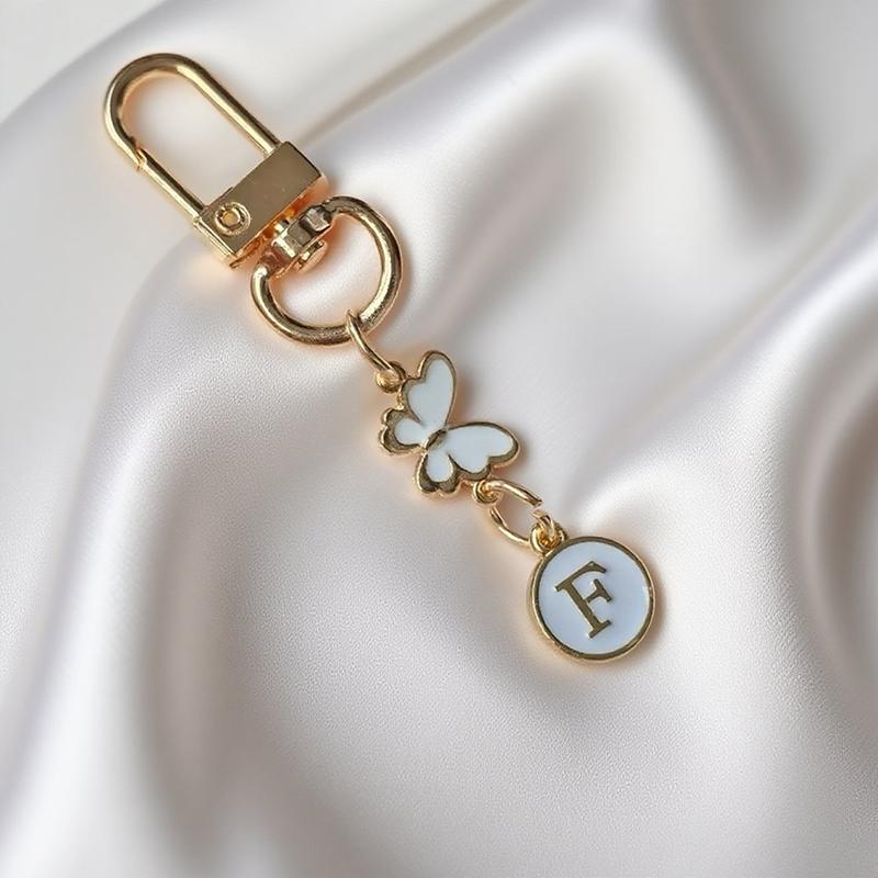 Metalowy Brelok z Literą Motyla A-Z 26 Liter Brelok Urok Uchwyt na Klucze Samochodowe Zawieszka do Torby Akcesoria Biżuteria Prezent