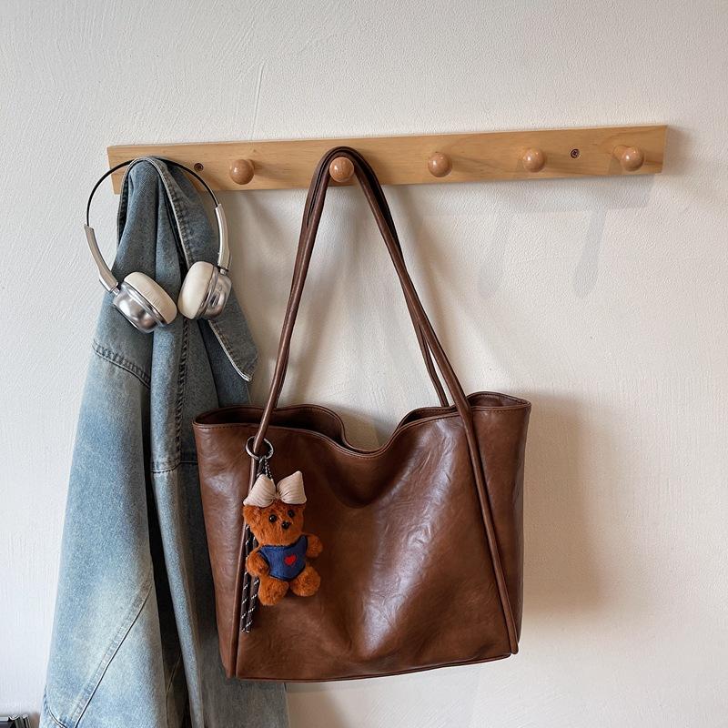 Bag women's new soft leather tote bag large capacity women's niche high-end sense of commuting to work portable shoulder bag