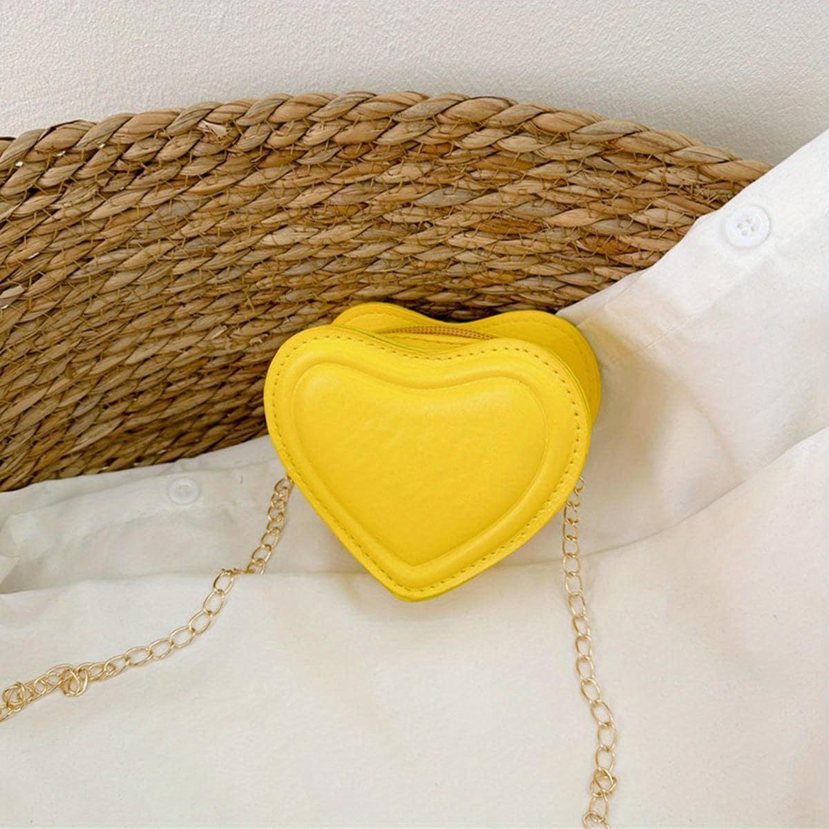 

Минималистичная женская сумка кроссбоди однотонного цвета с цепочкой на ремешке на День святого Валентина one-size жёлтый