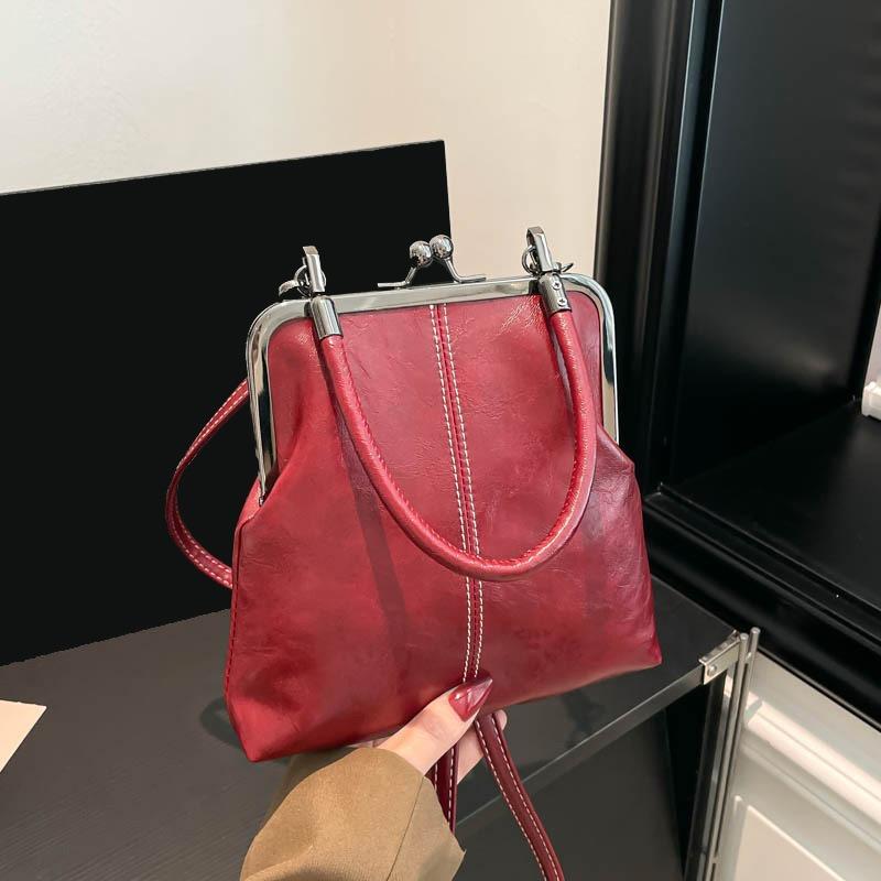 New retro soft leather shell women's bag fashionable women's shoulder messenger bag portable clip bag