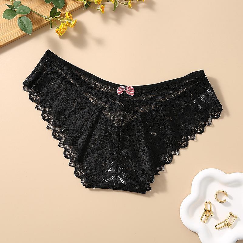 

Женские кружевные трусики со средней посадкой и перекрещивающимися бретельками M чёрный