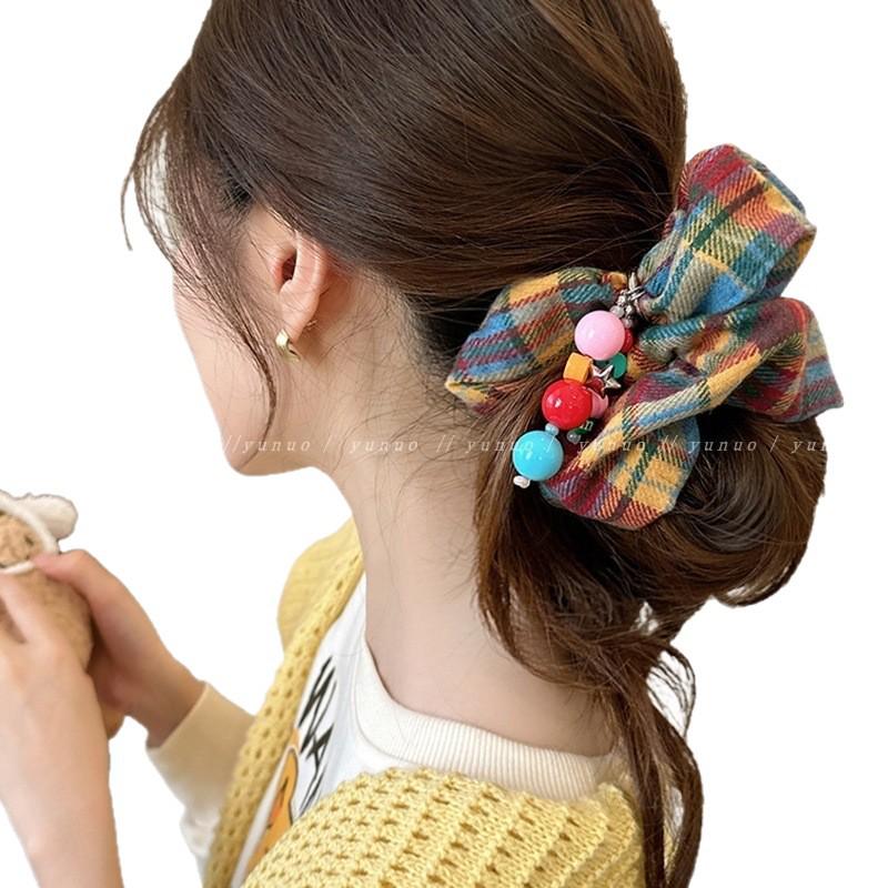 Herbst/Winter 2024 Buntes Karomuster Hohelastisches Haargummi für Damen