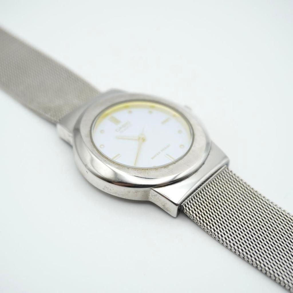 Used [New Battery] CASIO MTP-1112 Blue x Yellow Reflective Glass Ladies Working Item Quartz