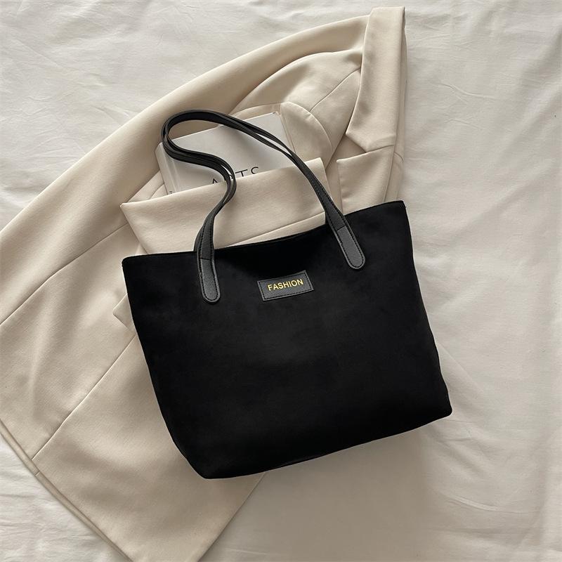 Сумка женская новая модная и повседневная большой вместимости простая наплечная сумка контрастной расцветки с拼接нием портативная сумка-тоут