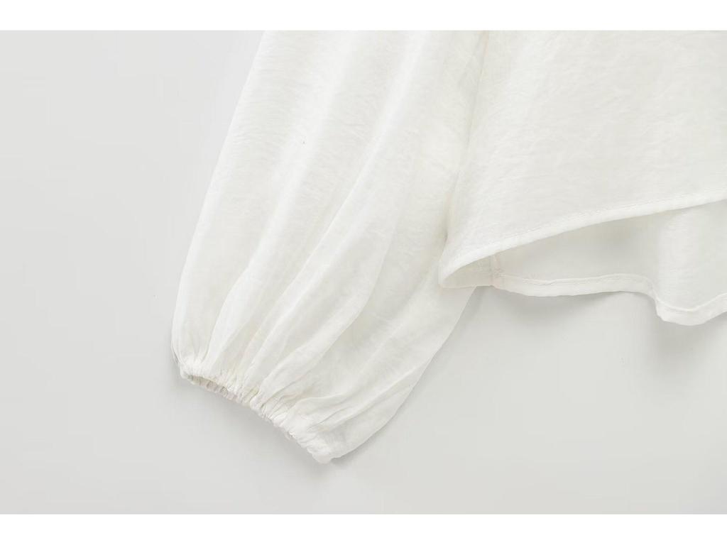 Chemise polyvalente à volants et à nouer style européen et américain pour femmes printemps 2025