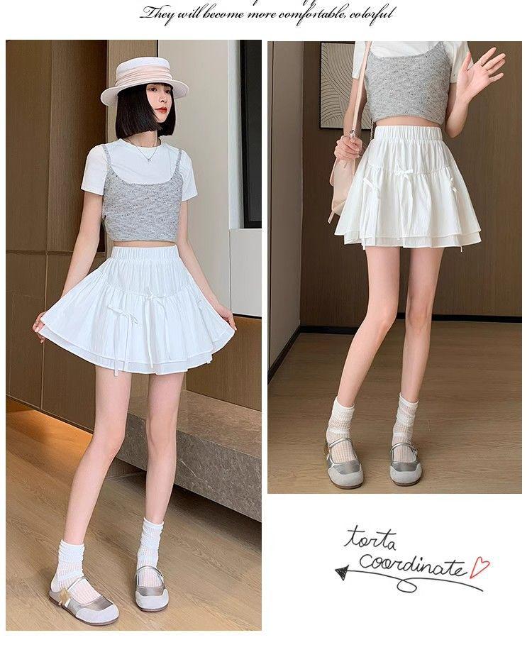 Letní nadýchaná sukně s vysokým pasem a mašlí se všitými bezpečnostními šortkami - Dámský design proti odhalení