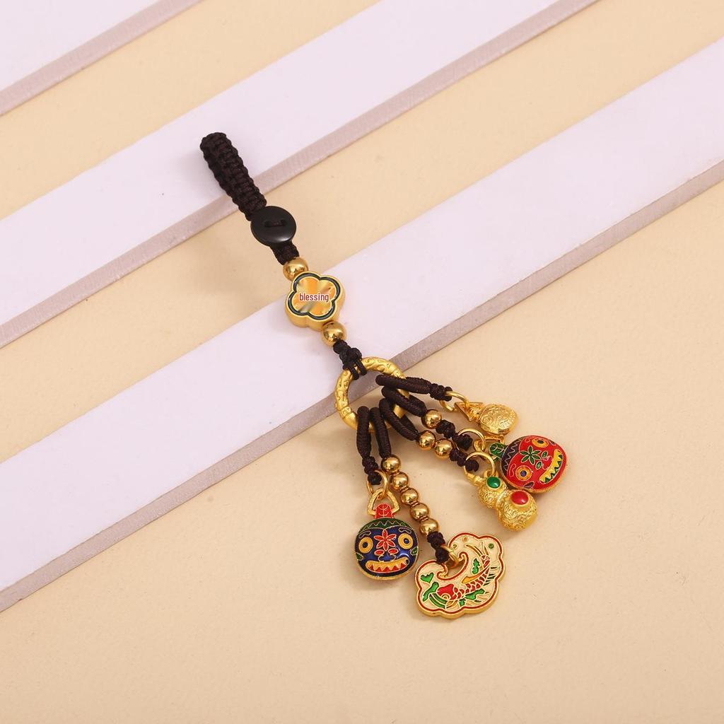 Goldener Glücksschlüsselanhänger: Reichtumsgott verschlingt Goldtier für Familie, perfekt als Auto- oder Handyanhänger.