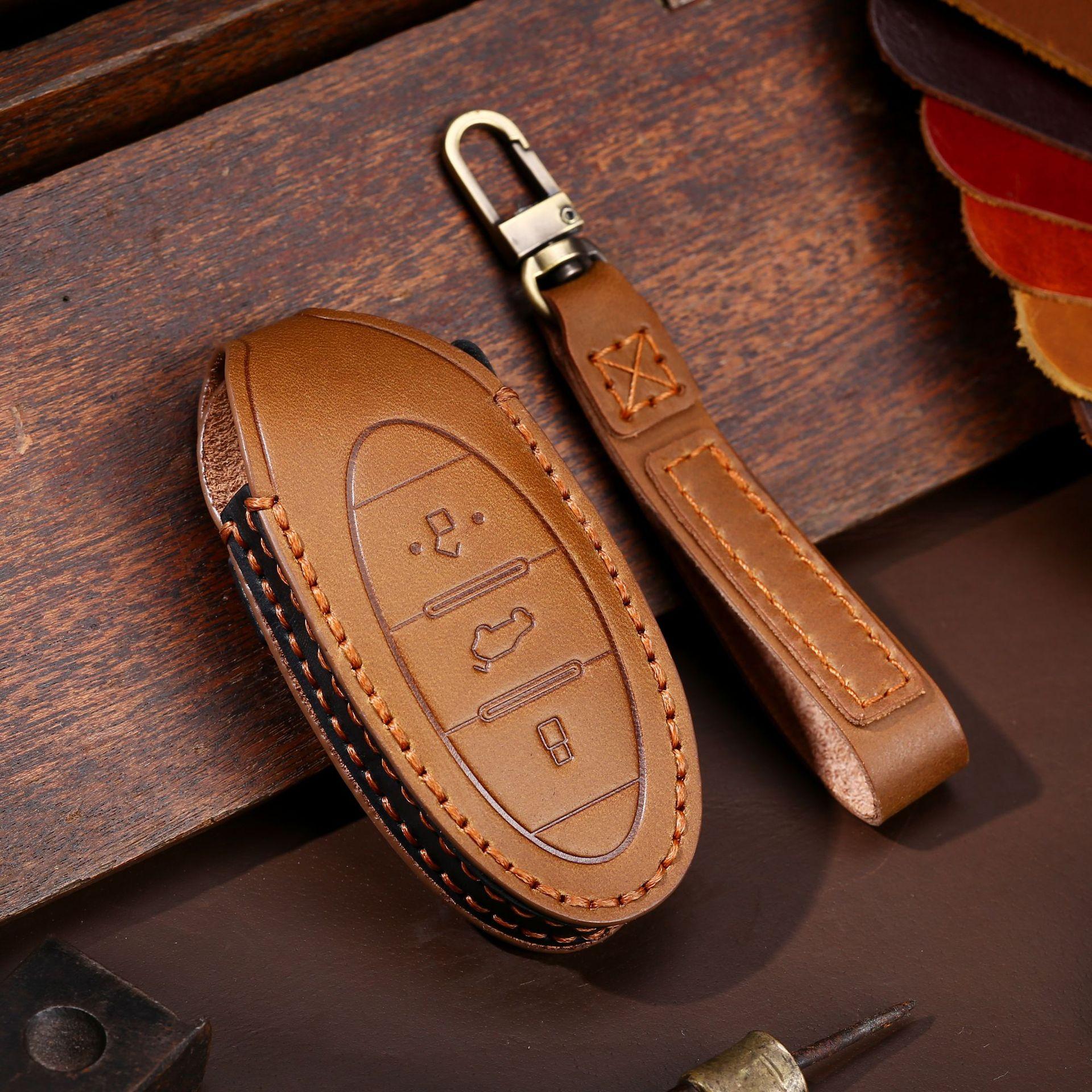 

The key cover is suitable for Pentium T77 key cover, FAW Pentium T55 new T99 car key cover. коричневий