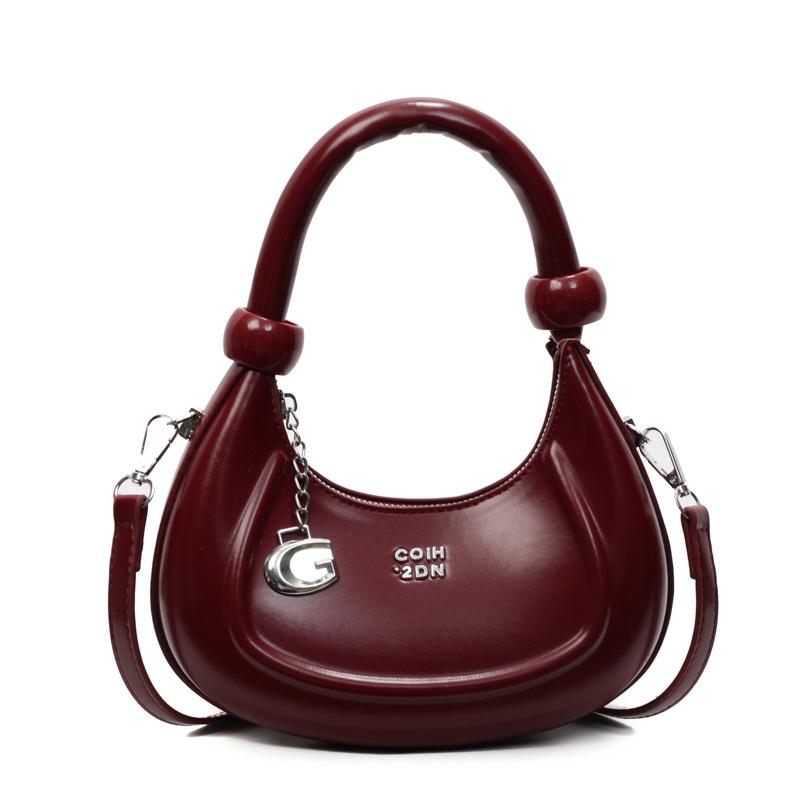 

2025 new fashion high sense niche crescent bag women s simple temperament versatile commuter oil wax leather messenger bag бордовый