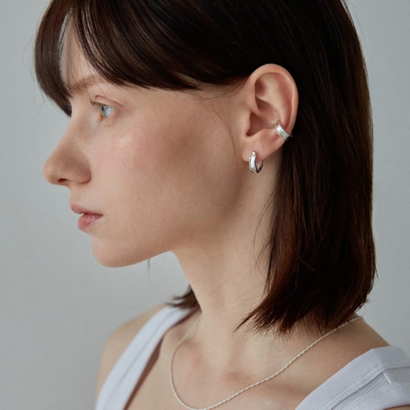 TIERNO E.002/SIGNATURTAG ÖRONMANCHETT