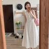 Beige polka dot jacquard sleeveless dress women's summer 2026 new French first love milk sweet A-shaped long skirt