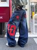 Jeans Larghi Unisex con Stampa a Toppe a Stella