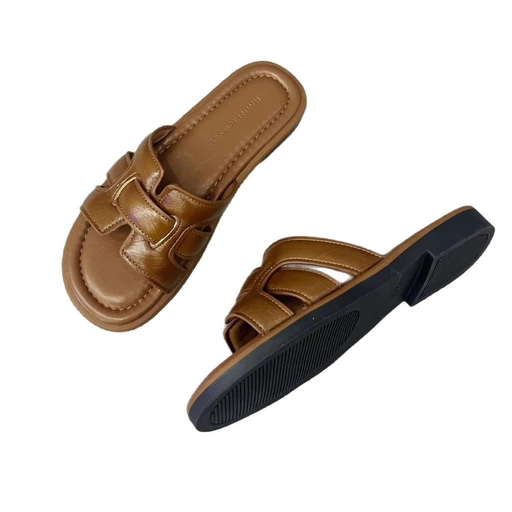 Retro French one-word slippers women's summer wear 2025 new Internet celebrity flat-bottomed seaside vacation sandals casual sandals