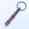 In-Stock Black Shock Absorber Keychain: Pressable Metal Spring Accessory - Perfect Small Gift