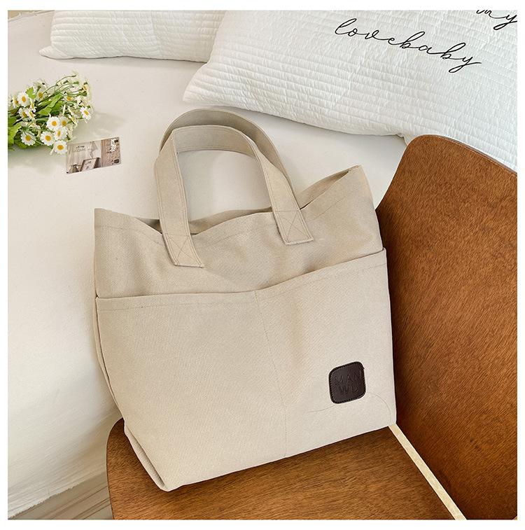 

Women s bag spring new fashion versatile niche design tote bag trendy portable shoulder bag грязно-белый
