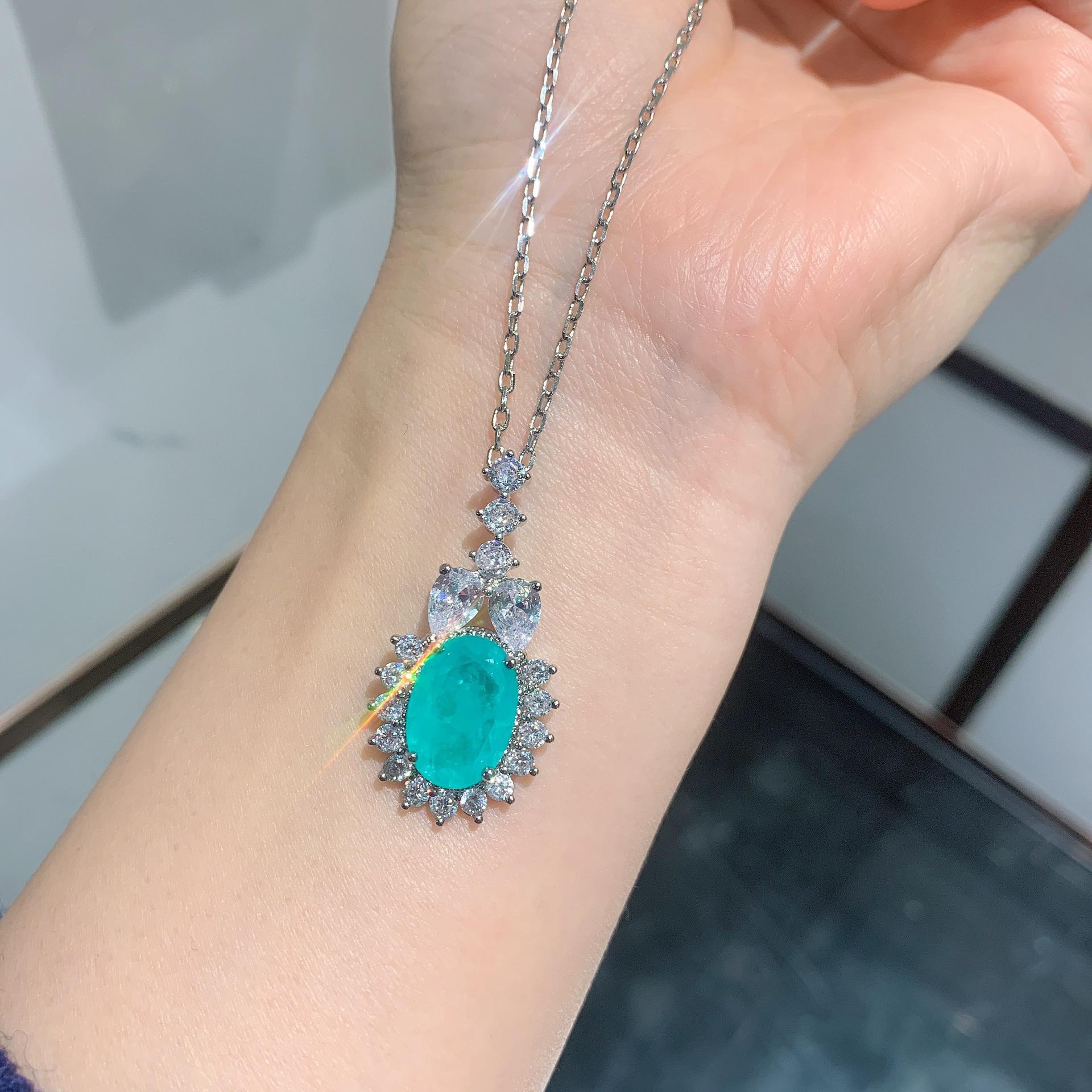 

Ювелирные изделия Ретро Симуляция Параиба Ювелирный набор Серьги-пусеты Главный камень 8 * 12 Подвеска 10 * 14