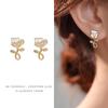 French Retro Pearl Clip-On Earrings: Mosquito Coil Design, Hong Kong Niche Style, No Piercing Needed, Women's High-End Fashion Accessories.