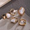European-American Hot Selling Geometric Baroque Pearl Ring for Women - Retro Light Luxury Flower Design