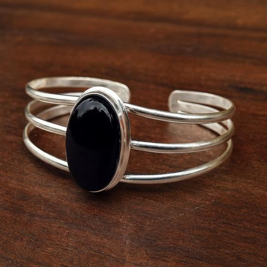 

Браслет-манжета с овальным камнем черный оникс, серебро 925 пробы, регулируемый браслет с тремя полосками Adjustable серебряный