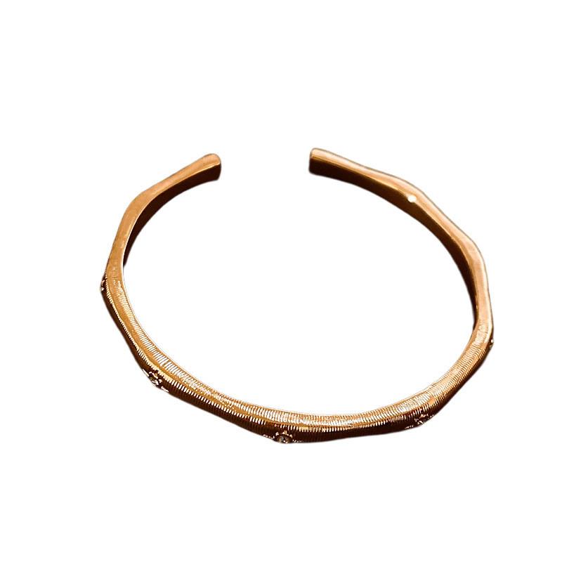 

Vintage Sun Design Copper And Plastic Bracelet With Electroplated Finish For Fashion Enthusiasts