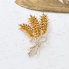 Elegant Gold Wheat Ear Brooch: Women's Anti-exposure Corsage Pin for Suit Coats