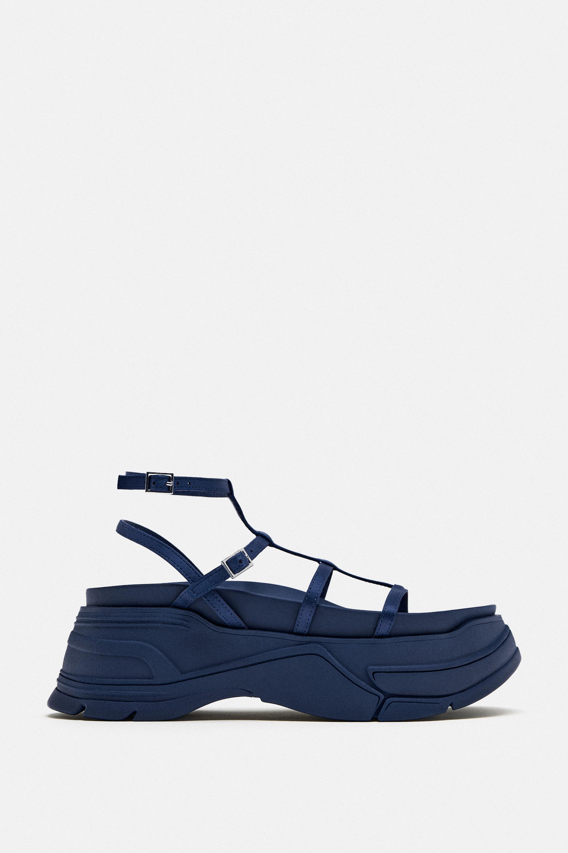 

САНДАЛИИ НА ПЛОСКОЙ ПЛАТФОРМЕ НА ШНУРОВКЕ