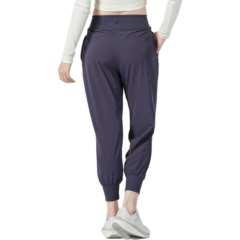 Nike Jednobarevné sportovní ležérní kalhoty s elastickým pasem a manžetami Dámské spodní díly Fialová DV9454-015