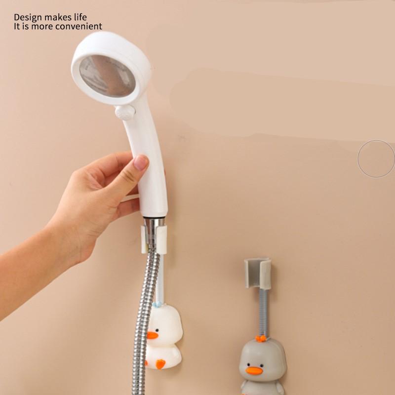 Buy Cartoon duck shower head stand, household universal adjustment