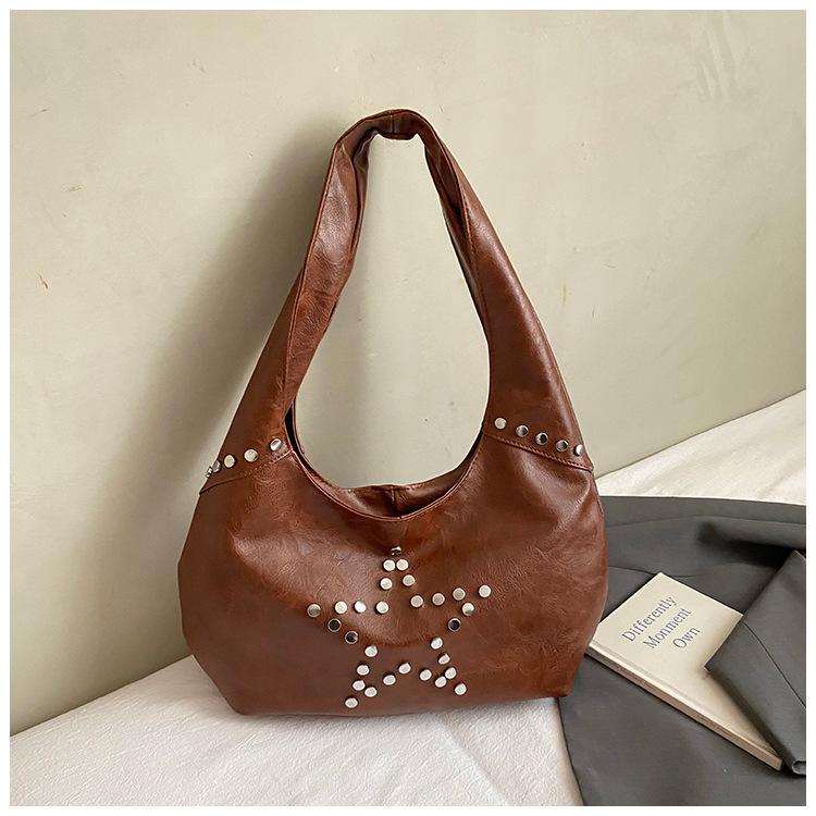 

2025 autumn new texture retro rivet shoulder armpit bag European and American fashion large capacity fashion bucket bag