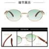 Fashion European and American sunglasses new women's oval frame metal glasses advanced sense Internet celebrity sunshades