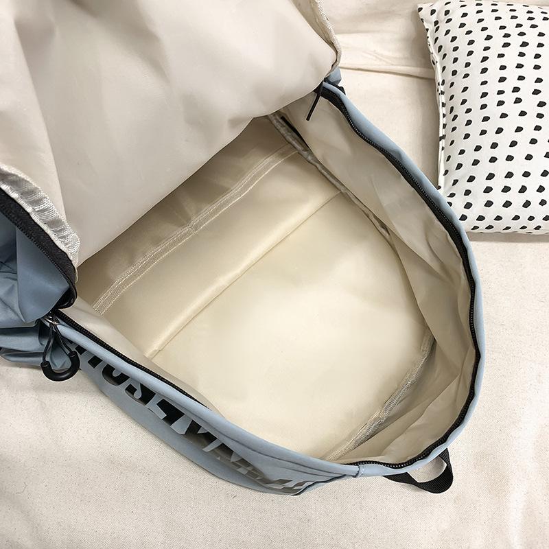School bag solid color letter fashion backpack Korean version college student lightweight school bag outdoor travel large capacity backpack