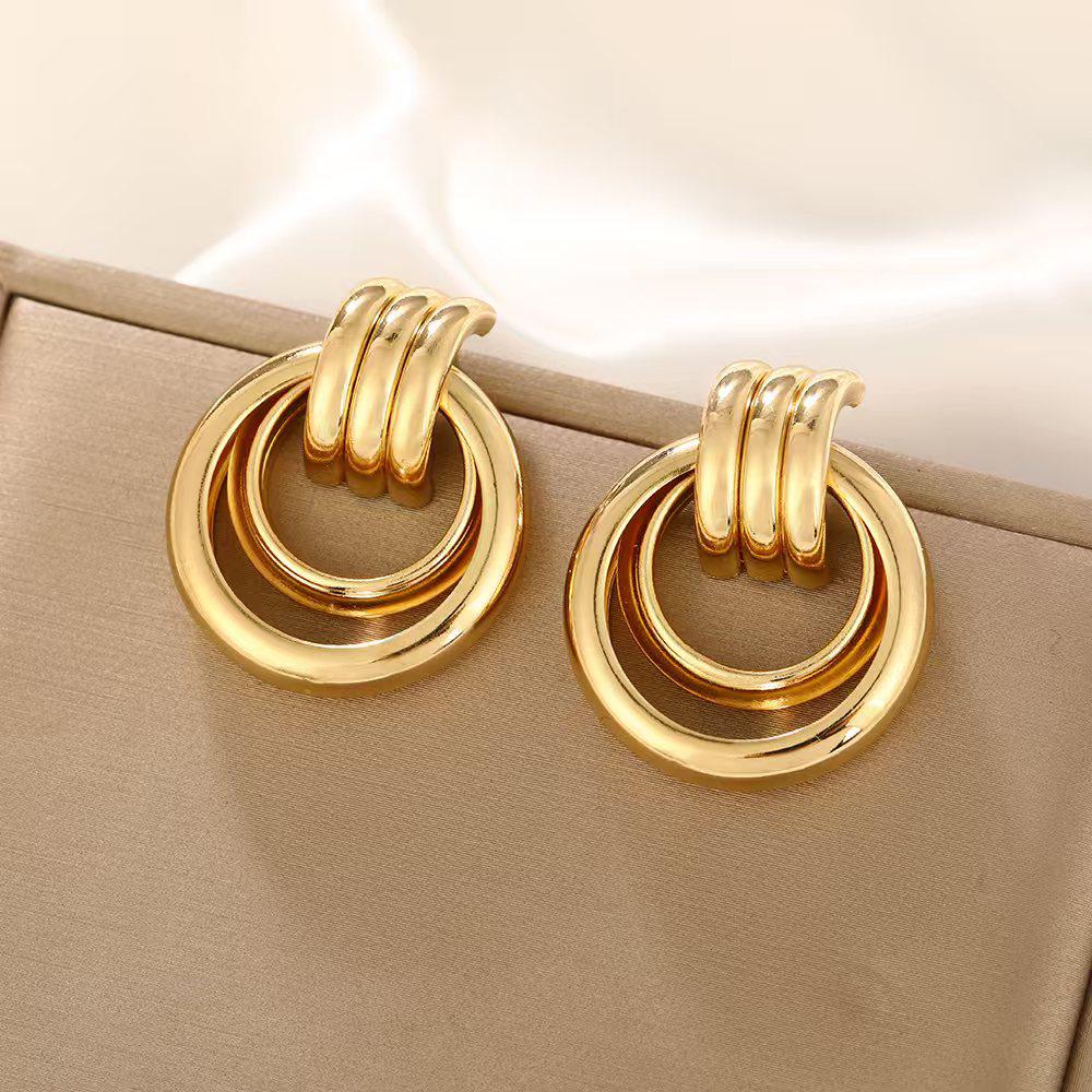 Europäisch-Amerikanische Geometrische Twist Kreis Ohrringe – Stilvoll, Mehrschichtig und Vielseitig